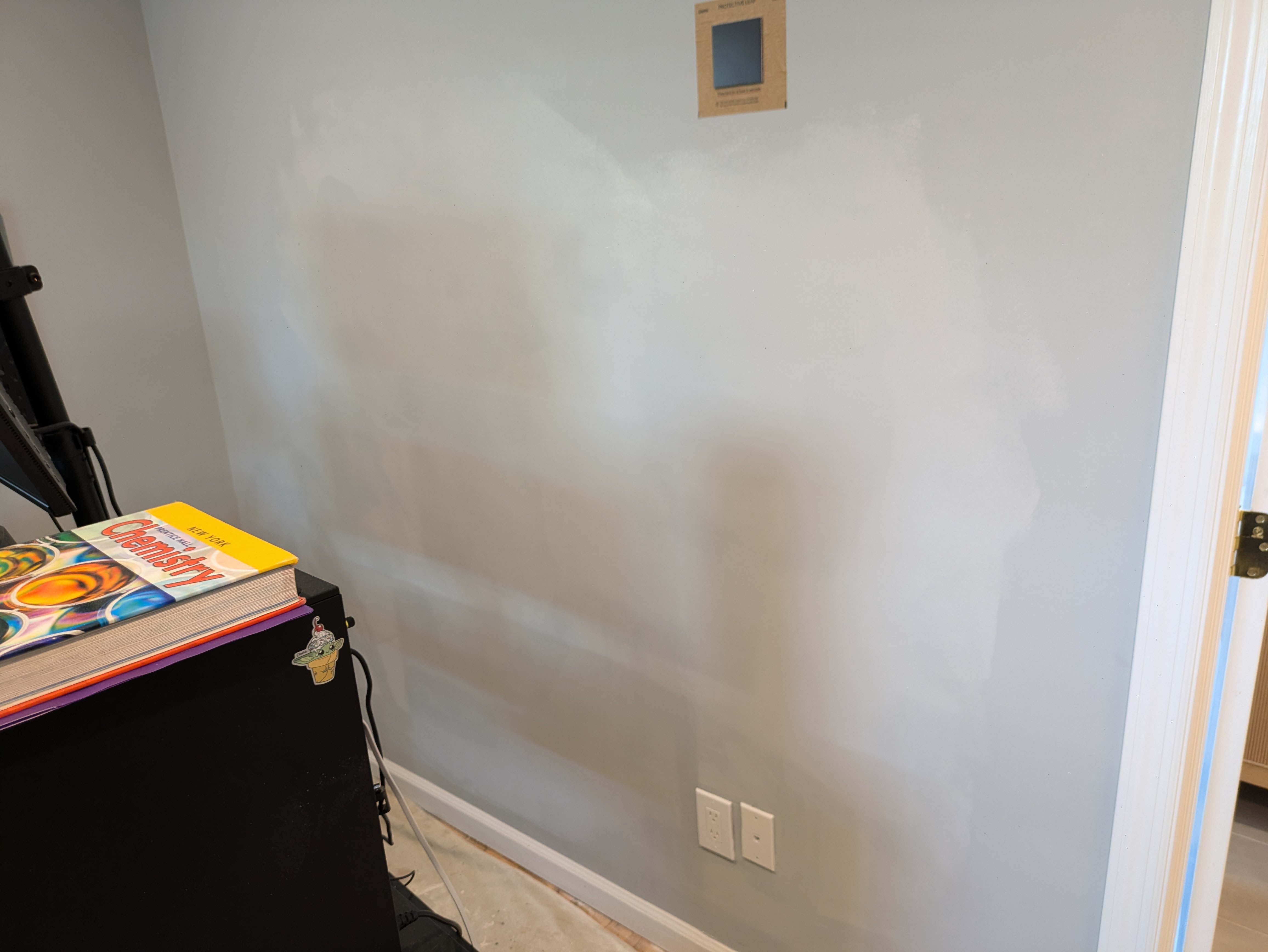 Wall prepared for equipment mounting with outlets installed below